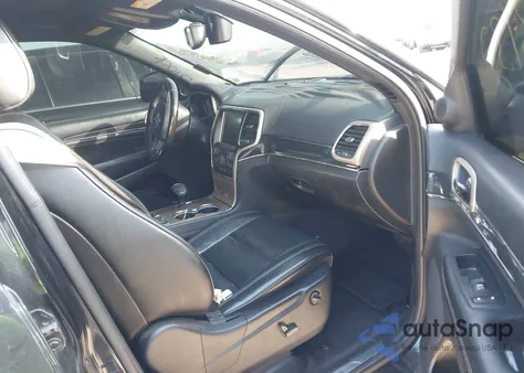 2015 Jeep Grand Cherokee Overland z USA, uszkodzony, nr VIN 1C4RJFCG9FC237173